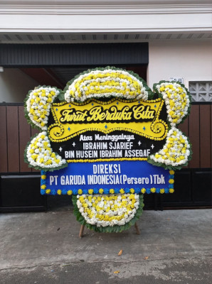 Papan Bunga Duka di Maja